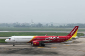 An airplane of VietJet Airline is seen at Noi Bai International Airport in Hanoi