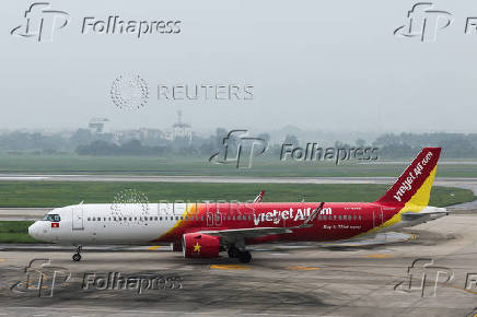 An airplane of VietJet Airline is seen at Noi Bai International Airport in Hanoi