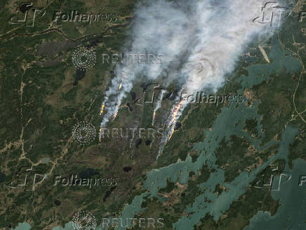 Smoke rises from wildfires in Manitoba