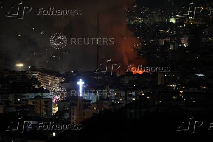 Israeli strike on Beirut's southern suburbs, after the Israeli military issued an evacuation warning for the area, as seen from Baabda