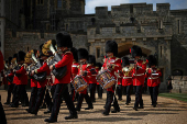 The Band of The Coldstream Guards enter the Quadrangle during a ceremony to present new Colours to the 1st and 2nd Battalion (Number 7 Company) the Coldstream Guards at Windsor Castle