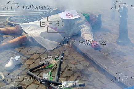 Health unions and workers protest use of aid withholding as weapon of war in Brussels