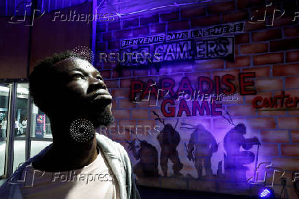 Katsuhiro Harada, Japanese director, producer, and creator of the video game Tekken, visits the Paradise Game room in Abidjan