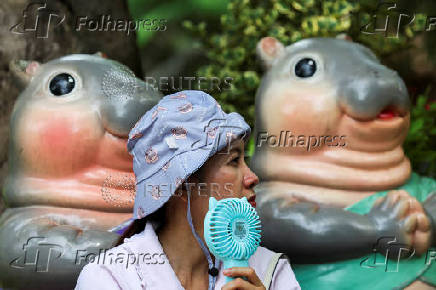 ?Moo Deng?, a female pygmy hippo celebrates her first birthday in Chonburi province