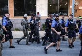 Rally in solidarity with Los Angeles protests against federal immigration sweeps, in Austin