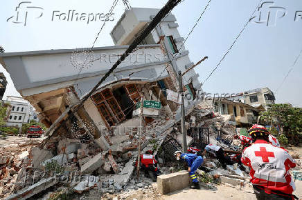 Chinese rescue personnel work following the earthquake, in Myanmar
