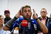 Opposition former governor candidate for Miranda State, Requesens, addresses the media, in Caracas
