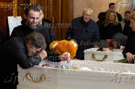Funeral of the Tamara, Stanislav and Roman Martyniuk who were killed in a Russian missile strike in Korostyshiv