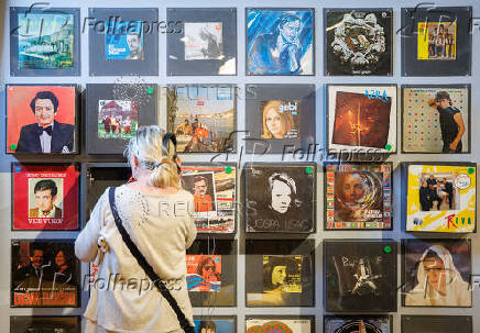 A visitor listens to music in Red History Museum in Dubrovnik