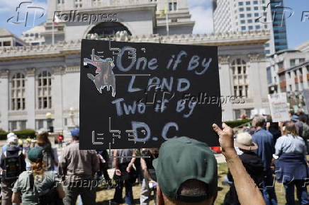 People Rally to Protest Trump policies and Billionaires agenda
