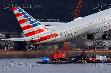 FILE PHOTO: Aftermath of American Eagle flight 5342 crash in the Potomac River near Ronald Reagan Washington National Airport