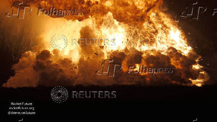 Flames rise as a SpaceX rocket explodes in Brownsville