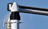 A Dragon crew capsule sits atop a Falcon 9 rocket at Launch Complex 39-A as the Axiom-4 crewed mission prepares for its launch to the International Space Station