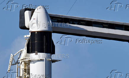 A Dragon crew capsule sits atop a Falcon 9 rocket at Launch Complex 39-A as the Axiom-4 crewed mission prepares for its launch to the International Space Station