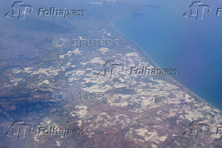 An aerial view shows vegetable plantation greenhouses, in Battipaglia