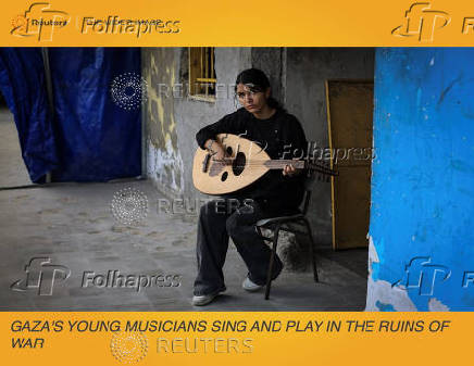 The Wider Image: Gaza's young musicians sing and play in the ruins of war