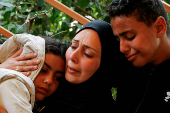 Palestinians mourn loved ones killed in Israeli strikes