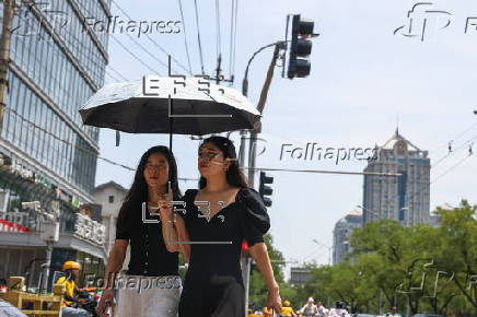 Beijing issues orange alert for heatwave