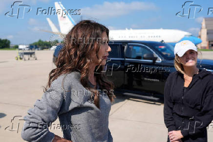 U.S. Homeland Security Secretary Kristi Noem arrives to board her plane at Joint Base Andrews