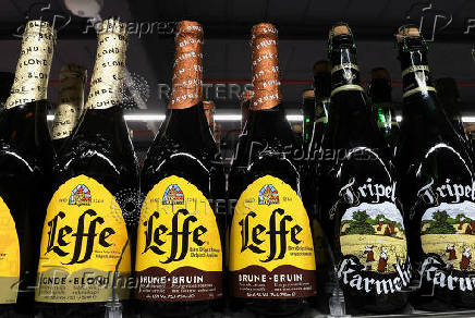 Bottles of Belgian beer are displayed for sale at a supermarket in Sint-Pieters-Leeuw