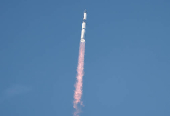 SpaceX's next-generation Starship spacecraft atop its Super Heavy booster is prepared for launch