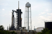 A Falcon 9 rocket stands at the pad before its upcoming launch of the Axiom-4 crewed mission to the International Space Station