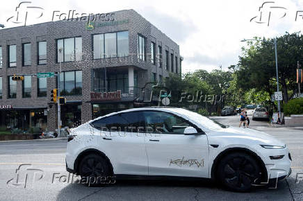 FILE PHOTO: Tesla robotaxis launch in Austin, Texas