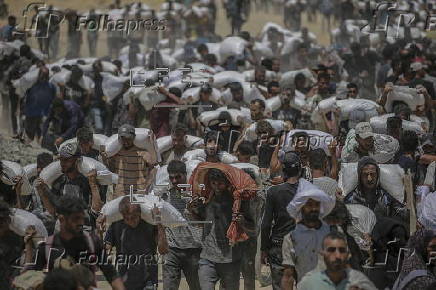 Aid enters Gaza Strip after Israel announces daily pause of hostilities