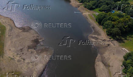 A drone view shows partially dried sections of the Jumbles Reservoir near Blackburn