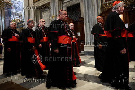 Cardinals visit the tomb of the late Pope Francis at the Basilica of Saint Mary Major, in Rome
