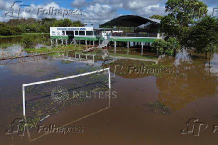 A drone image shows a flooded football field following the rise of the Solimoes River in the rural area of Manacapuru