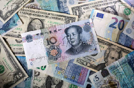 FILE PHOTO: Illustration shows U.S. dollar, Euro, Chinese Yuan and Pound banknotes