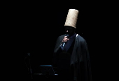 Members of Whirling Dervishes perform in Tunis