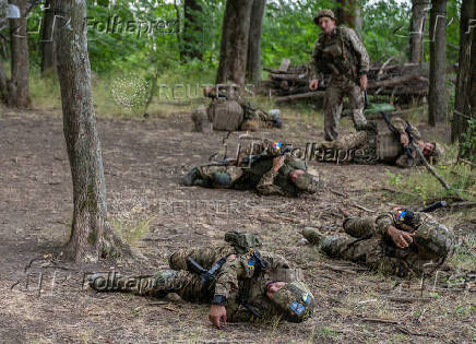 Foreign volunteers of the Ukrainian National Guard brigade attend military exercises at a training ground near a front line in Kharkiv region