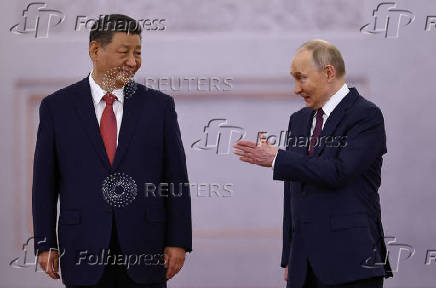 Russian President Putin and Chinese President Xi meet in Moscow
