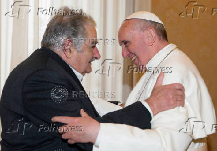 FILE PHOTO: Pope Francis meets Uruguay's President Mujica during a private audience at the Vatican