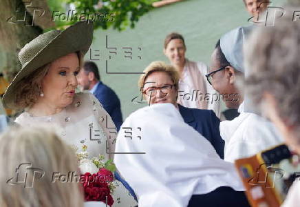 Queen Mathilde of Belgium visits the Beguinage 'Ten Wijngaerde' in Bruges
