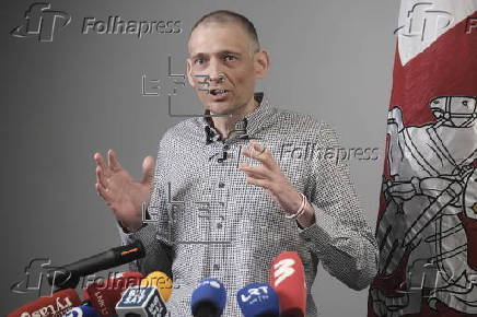 Belarus opposition leader Tikhanovsky reunites with wife in Lithuania after release
