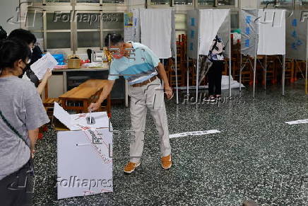 Voters cast their ballots in recall election for several Taiwanese legislators