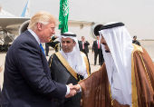 FILE PHOTO: Saudi Arabia's King Salman bin Abdulaziz Al Saud shakes hands with U.S. President Donald Trump during a reception ceremony in Riyadh