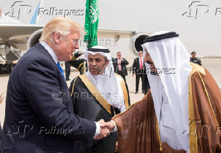 FILE PHOTO: Saudi Arabia's King Salman bin Abdulaziz Al Saud shakes hands with U.S. President Donald Trump during a reception ceremony in Riyadh