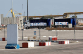 A truck carrying aid is parked at the Kerem Shalom crossing between Israel and Gaza, before going into Gaza, on the Israeli side of the Israel-Gaza border