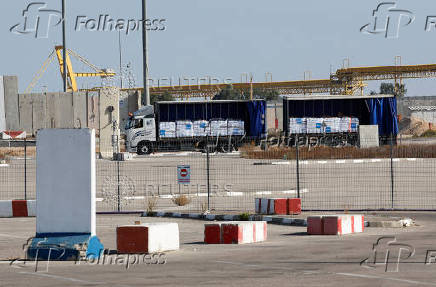 A truck carrying aid is parked at the Kerem Shalom crossing between Israel and Gaza, before going into Gaza, on the Israeli side of the Israel-Gaza border