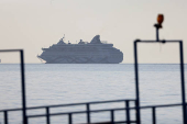 A view of the Crown Iris, a cruise ship which will be used to assist in the departure of Israelis from Cyprus, is seen off the coast of Limassol