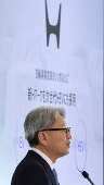 Honda CEO Toshihiro Mibe attends a business briefing in Tokyo