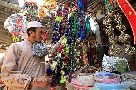Roadside shop sells ornaments ahead of Eid al-Adha in Peshawar