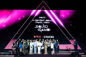 'Squid Game' characters parade through central Seoul
