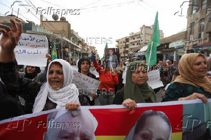 Syrian Kurds attend protest in solidarity with people in Sweida, in Qamishli