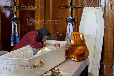 Funeral of the Tamara, Stanislav and Roman Martyniuk who were killed in a Russian missile strike in Korostyshiv