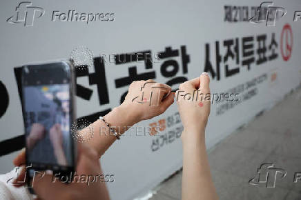 People cast early votes for the upcoming presidential election